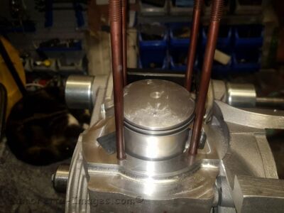 Piston and studs